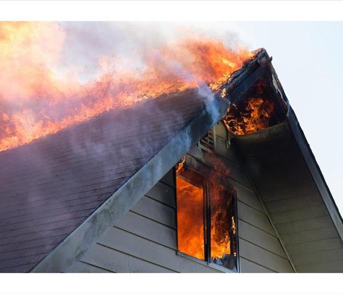  img src =”fire” alt = " residential home caught on fire and is spreading to the roof ” >